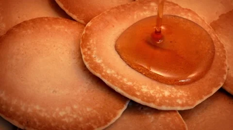 Syrup Poured On Breakfast Pancakes 61504380