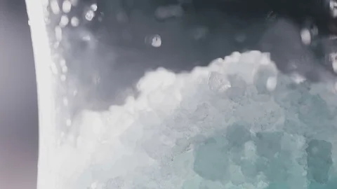 Syrup is poured into the hookah flask Stock Footage 77347181