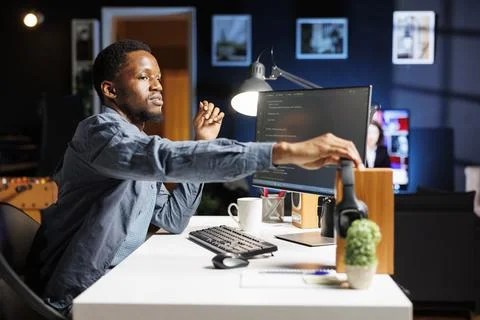 System admin generating IT scripts for data centers Stock Photos