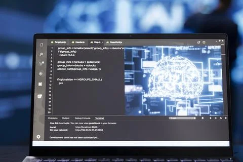System administrator analyzing complex AI brain models on laptop, close up Foto stock