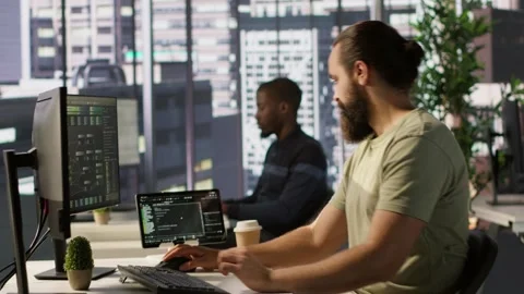 System administrator checking machine learning results on tablet Stock Footage 318160583