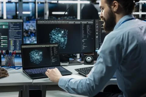 System administrator in data center using AI LLM assistant to do maintenance Stock Photos