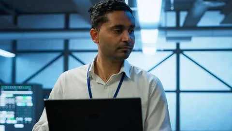 System administrator in data center using notebook 스톡 사진