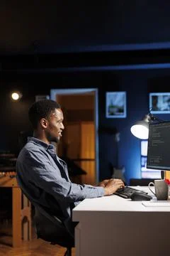 System administrator handling software optimization Stock Photos