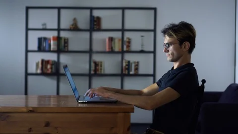 System Administrator looking for Updates, Using Laptop, Working in Coworking Stock Footage 93301120