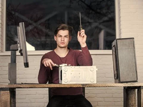 System Administrator. man fix computer device or printer Stock Photos