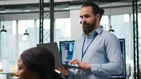System administrator in office developing software applications Video stock 313015281