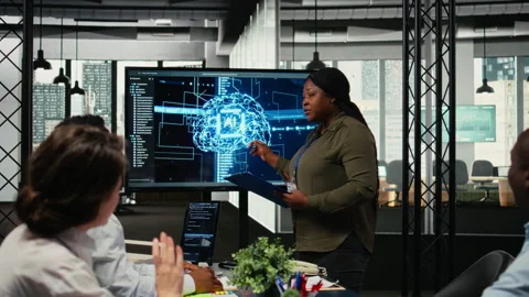 System administrator presents AI chatbot reducing work volume to executives Stock Footage 323144543