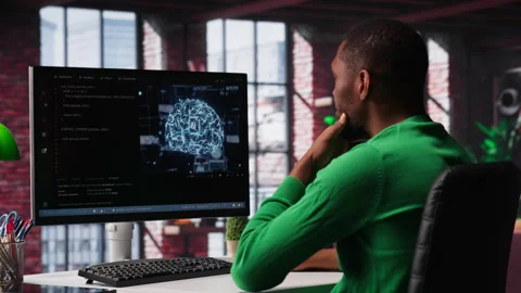 System administrator programming AI brain computerized model Stock Footage 307723577