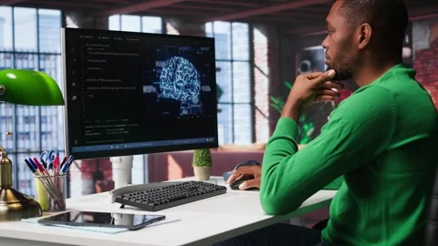 System administrator programming AI brain computerized model Stock Footage 309111362