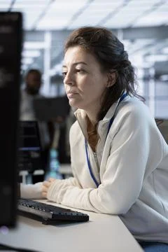 System administrator in server hub implementing power management solutions 스톡 사진