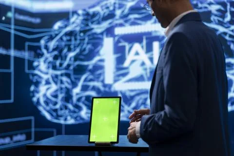 System administrator in startup doing advancements in AI field using mockup 写真素材