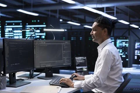 System administrator troubleshooting data center hardware Stock Photos