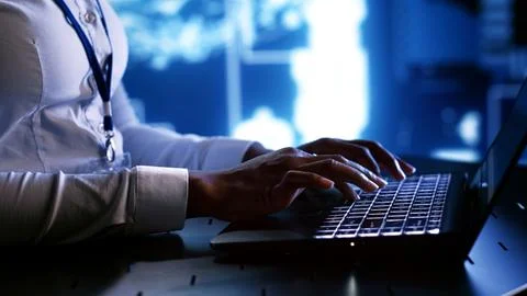 System administrator writing AI script Stock Photos