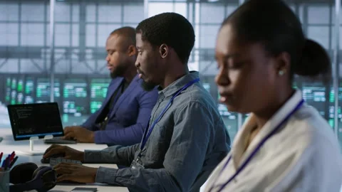 System administrators in data center implementing AI predictive systems Stock Footage 319523338