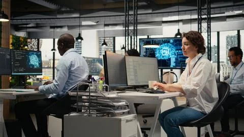 System administrators in office automate workflows using artificial intelligence 写真素材