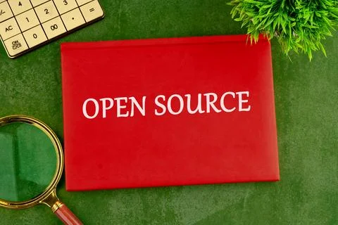 System and website builder concept. OPEN SOURCE on the cover of a red noteboo 写真素材