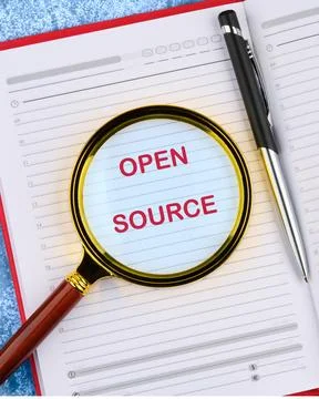 System and website builder concept. OPEN SOURCE in the business notebook. Cop Stock Photos