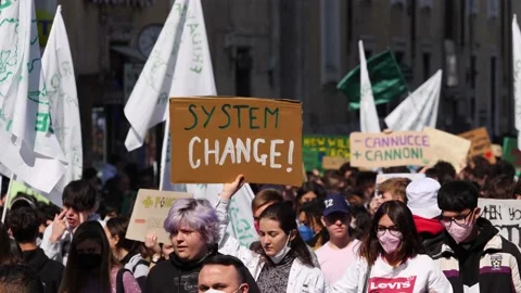 "System Change" banner at friday for future march. Rome,Italy, March, 25 2022 Stock Footage 172483520