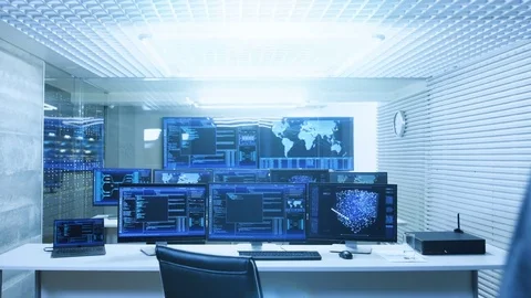 In the System Control Data Center Technician Operates Multiple Screens. Stock Footage 80978490
