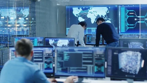 In the System Control Room Project Manage and IT Engineer Have Discussion. Stock Footage 80986190