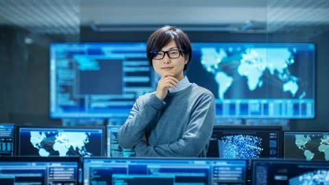 In the System Control Room Smart Engineer Turns and Makes Thinking Gesture. H 스톡 사진