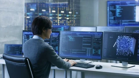 In the System Control Room Technical Operator Works at His Workstation  Stock Footage 80978446