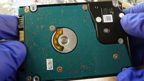 The system disk of the computer in the hands of the master. Stock Footage 303410489