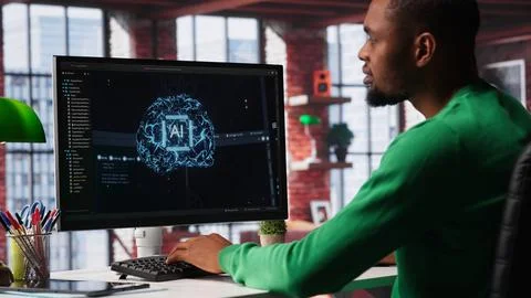 System engineer coding AI brain model of neural network for machine learning Stock Photos