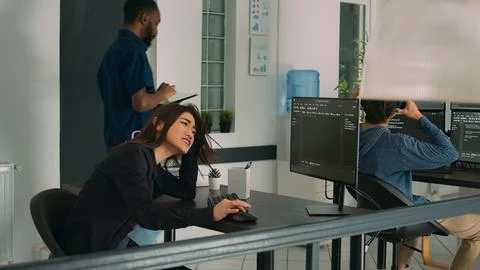 System engineer feeling confident about programming idea Stockfoto's