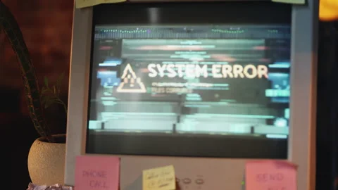 System error message flashing on retro computer screen in office, lost files Stock Footage 321084600