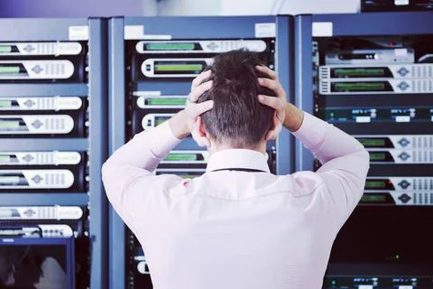 System fail situation in network server room it business man in network se... Stock Photos