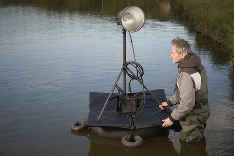System of floating light stand with folding platform for on water photography Stock Photos