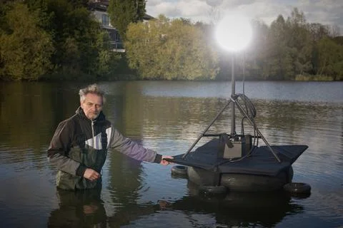 System of floating light stand with folding platform for on water photography Stock Photos