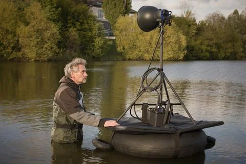System of floating light stand with folding platform for on water photography Stock Photos