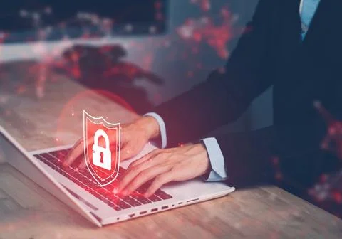 System hacked warning alert with lock on notebook (Laptop). Cyber attack on.. Stock Photos