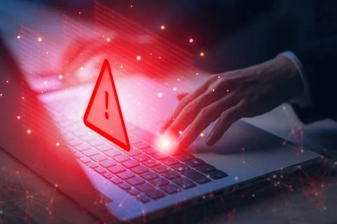 System hacked warning alert on notebook (Laptop). Cyber attack on computer .. Stock Photos