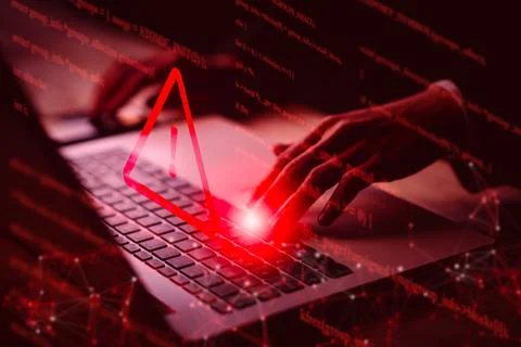 System hacked warning alert on notebook (Laptop). Cyber attack on computer .. Stock Photos
