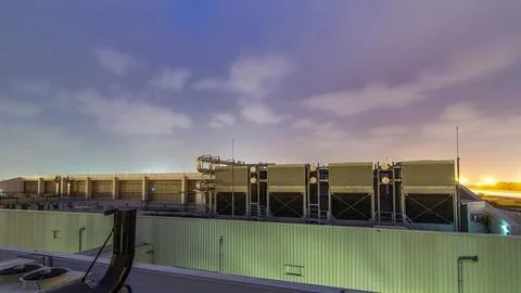 System of industrial central conditioning set on the roof of the building day Stock Photos