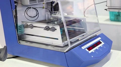 System for mixing and shaking tasks in laboratory Stock Footage 49464963