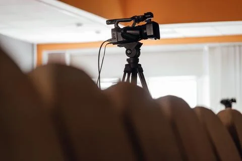 System of pair of 4k broadcasting cameras mounted on the top of auditorium Stock Photos