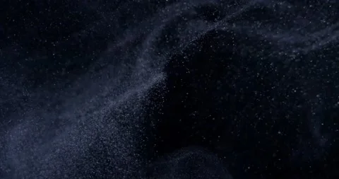 System of particles on black screen in slow motion. Atmosphere particle overlay Видео 217786893
