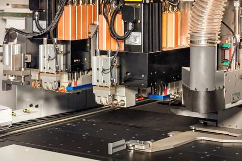 System of pressure and guide rollers in the automatic woodworking machine. Photos