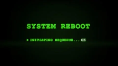 System Reboot Initiating Sequence on a Retro Computer Screen with Green Text Stock Footage 336617981