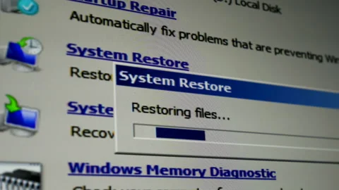 System restore restoring files signage on the computer workstation laptop of a Stock Footage 235922988