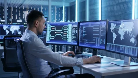 System Security Specialist Working at System Control Center.  Stock Footage