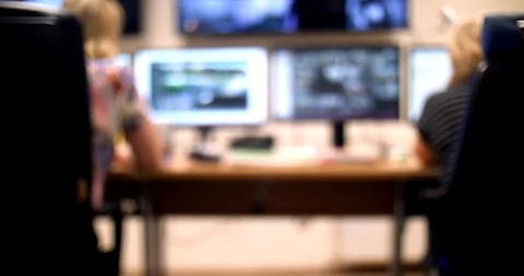 System Security Specialist Working at System Control Center. Room is Full of Видео 102383191