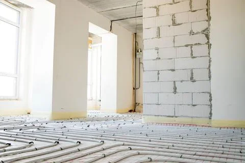 System of underfloor heating, work in progress on a construction site for a.. Stock Photos