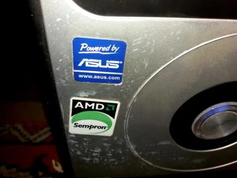 System Unit Featuring Stickers Showcasing Technology Brands and Specificati.. Stock Photos
