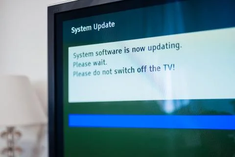 System update software process on a modern television set 스톡 사진